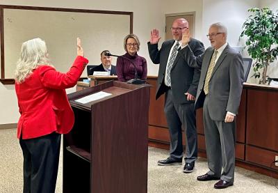 Preble County Probate Judge Jenifer Overmyer administers the oath of office for new Councilman Ball and Councilman Kirsch.