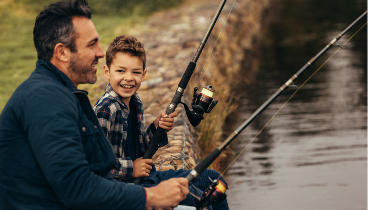Kid fishing with dad